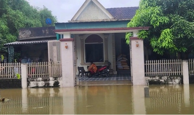 Lũ dâng cao sau mưa lớn tại xã Tân Lâm Hương (TP.Hà Tĩnh, tỉnh Hà Tĩnh). Ảnh: Thanh Niên