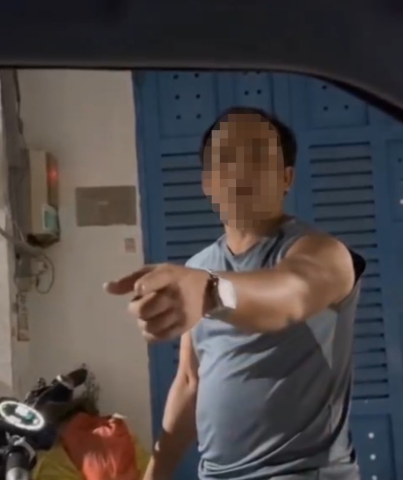 Người đàn ông say xỉn, thách thức tài xế đánh nhau. Ảnh: Thanh Niên.