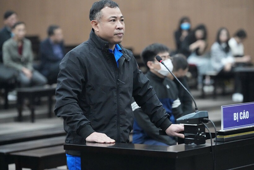 Bị cáo Nghiêm Quang Minh, chủ đầu tư căn hộ chung cư bị cháy tại phiên tòa sơ thẩm. Ảnh: Lao động Thủ đô