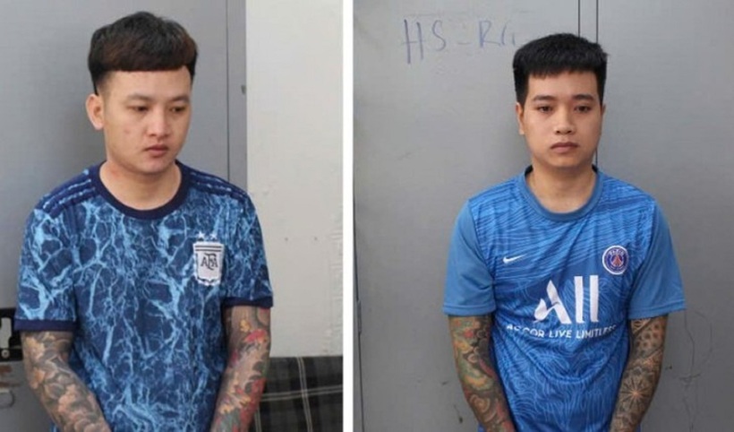 Bắt hai nghi phạm cho vay lãi suất 365-843%/năm. Ảnh: Tuổi Trẻ