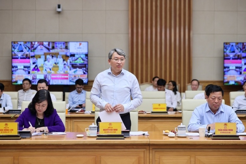 Bộ trưởng Bộ Tư pháp Nguyễn Hải Ninh phát biểu tại hội nghị - Ảnh: VGP/Nhật Bắc