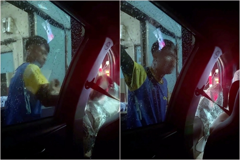 Người đàn ông chặn đường, đập bể kính xe taxi công nghệ. Ảnh: Pháp Luật TP.HCM