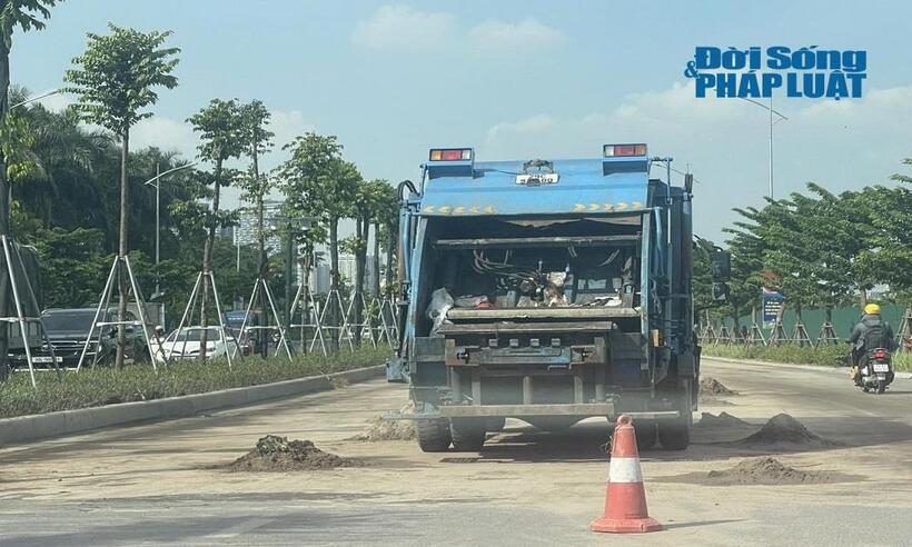 Hà Nội: Xe bồn vỡ téc, dầu diesel loang trơn đoạn đường Lê Quang Đạo kéo dài - 3