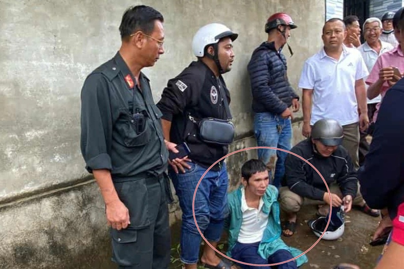 Nghi phạm Nguyễn Nam Đại Thuận (áo xanh) bị bắt giữ. (Ảnh: Cơ quan công an)