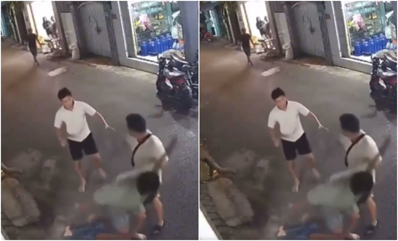 Nhóm người hành hung nạn nhân giữa đường. (Ảnh: NLĐ)