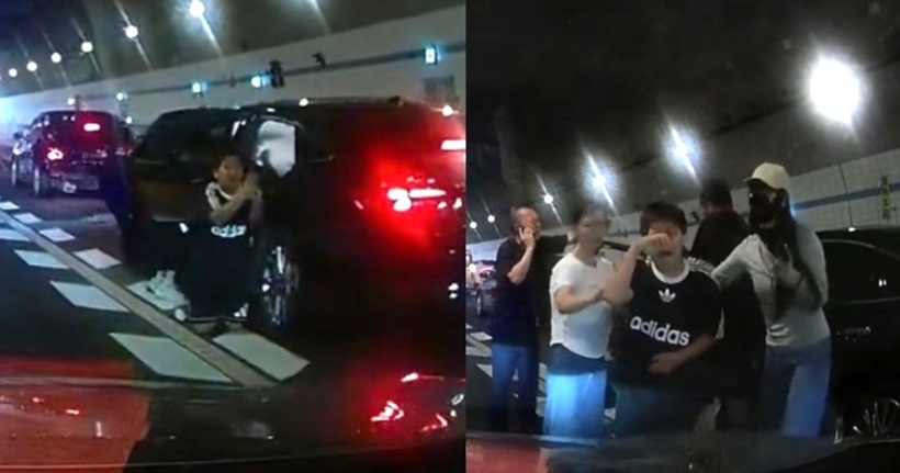 Bé trai bước xuống, quỳ gối ngay giữa làn xe, liên tục cầu cứu mọi người. Ảnh: Mothership.