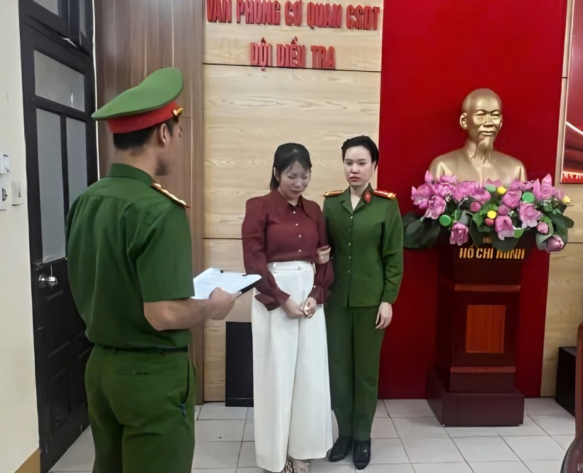 Cơ quan điều tra đọc Lệnh bắt bị can để tạm giam đối với Trần Thị Thùy Linh. ẢNh: Tiền Phong