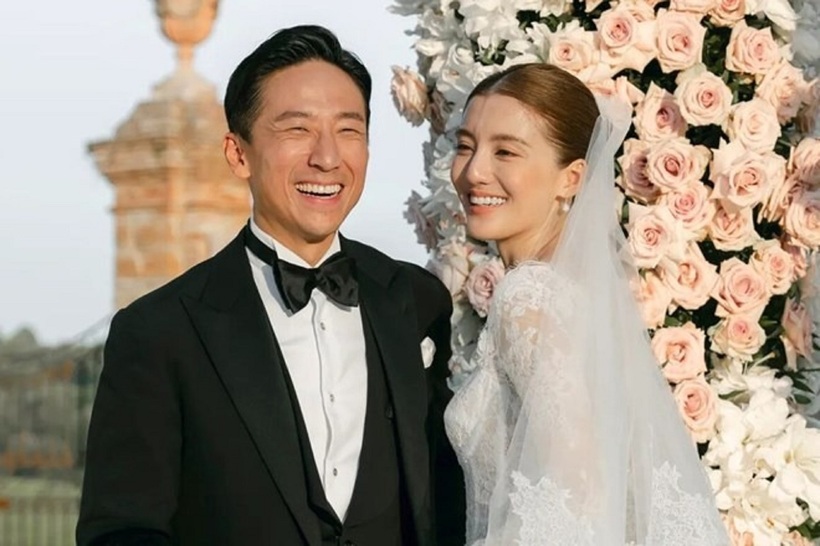 Nữ diễn viên Ngô Thiên Ngữ và doanh nhân Thi Bá Hùng. Ảnh: Xinhua