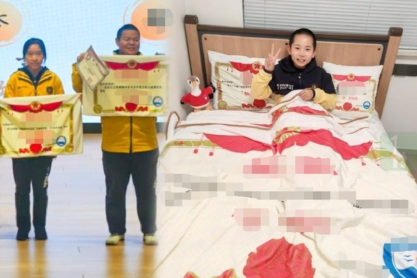 Trường học gây chú ý khi tặng chăn in giấy khen cho học sinh xuất sắc. Ảnh: SCMP.