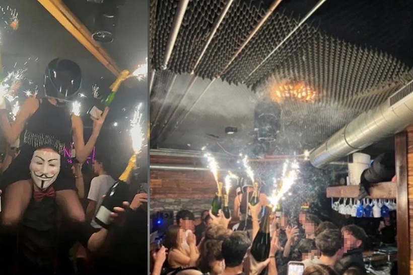 Hình ảnh trên mạng xã hội cho thấy cảnh nhân viên cầm các chai champagne có pháo sáng đưa gần trần nhà, sau đó là cảnh trần nhà bị bắt lửa. Ảnh: CNN