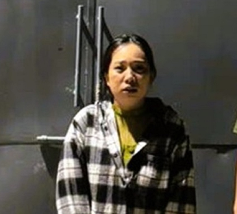 Lê Thị Cẩm Tú ra đầu thú. Ảnh: Công an Đồng Nai