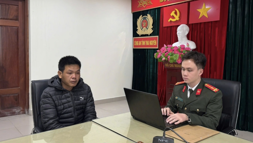 Đối tượng Nguyễn Ngọc Quang tại cơ quan công an. Ảnh CACC