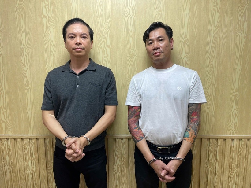 Mã Thanh (bên trái) và Ngô Duy Đông bị cảnh sát bắt khẩn cấp. Ảnh: Dân Trí.