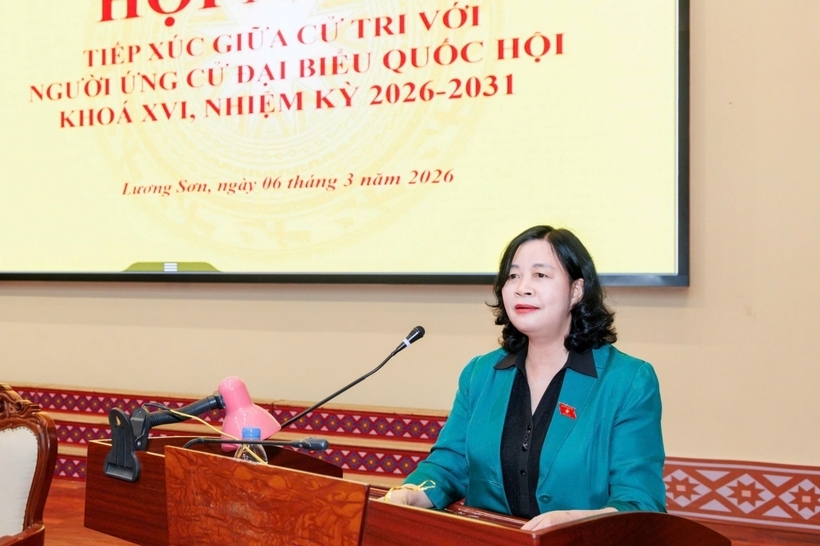 Chủ tịch UBTƯ MTTQ Việt Nam Bùi Thị Minh Hoài trình bày Chương trình hành động tại hội nghị (Ảnh Quang Vinh).