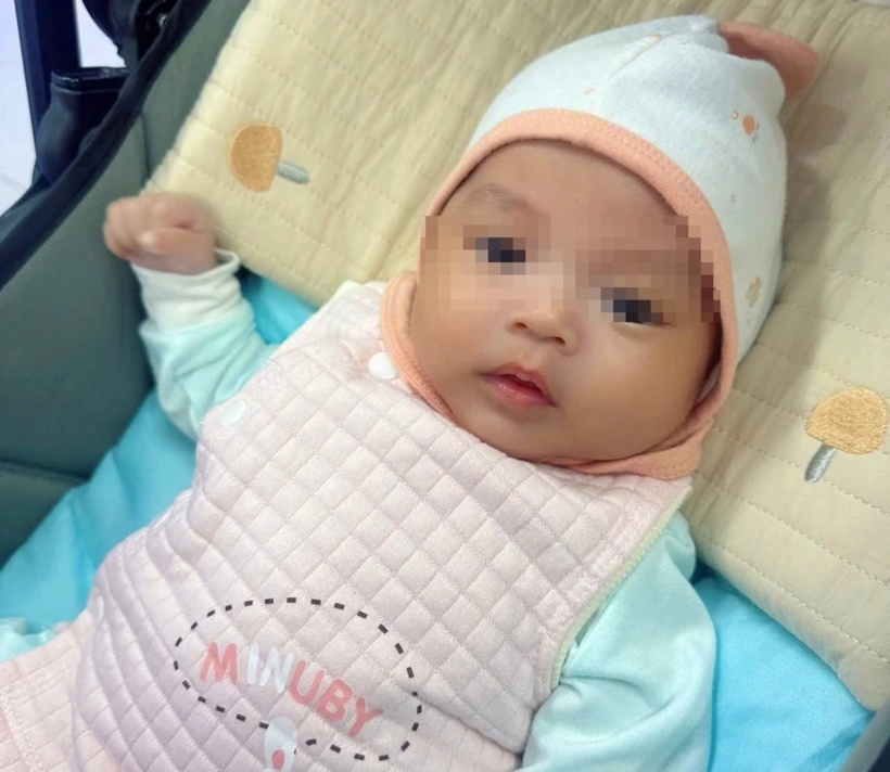 Bé gái bị vùi lấp trong vườn cao su đã được gia đình ở Đà Nẵng nhận nuôi. (Ảnh: Pháp luật TP.HCM)