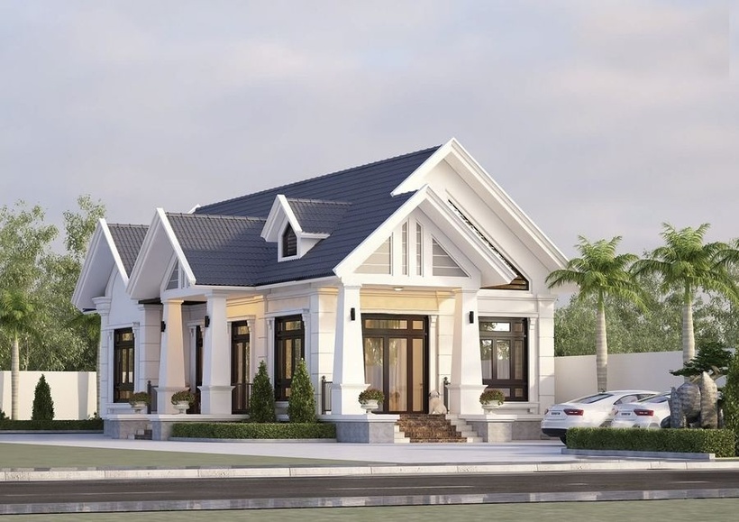 Mẫu nhà mái thái 1 tầng hiện đại với sự kết hợp giữa tone trắng và xanh navy sang trọng.