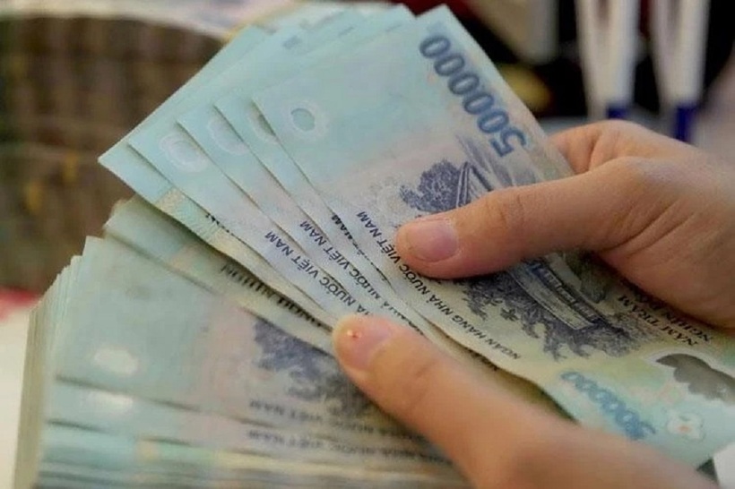 Bộ Tài chính làm rõ việc chuyển khoản lương từ 5 triệu đồng nhằm minh bạch thuế, không lấn át quyền thỏa thuận trả lương theo Bộ luật Lao động hiện hành. Ảnh minh họa