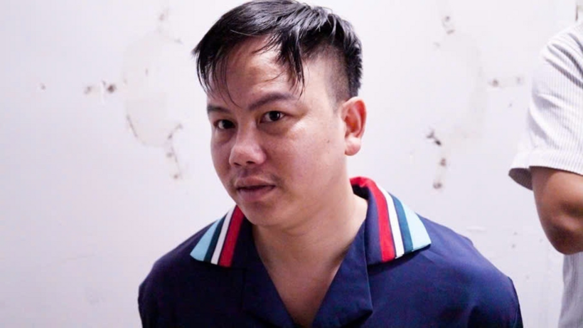Trương Ngọc Hòa bị lực lượng công an bắt giữ. Ảnh: Dân trí