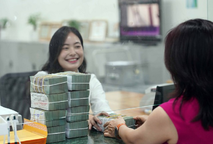 Lãi suất huy động giảm. ẢNH: NGỌC THẮNG