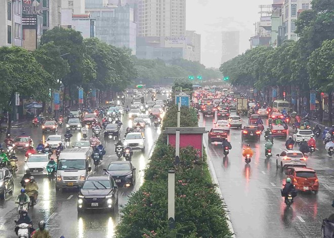 Hà Nội sẽ có mưa rào và dông ngày 26/6. Ảnh minh họa.