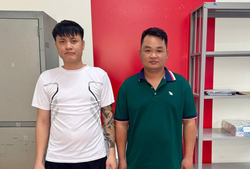 Đối tượng Nguyễn Huy Hoàng (áo trắng) và Nông Xuân Vĩ. Ảnh: Công an Cao Bằng