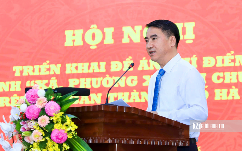 Ông Nguyễn Xuân Lưu - Phó Chủ tịch UBND Thành phố Hà Nội đã công bố quyết định về việc ban hành đề án triển khai thí điểm mô hình xã, phường xã hội chủ nghĩa (Ảnh: Quang Thái).