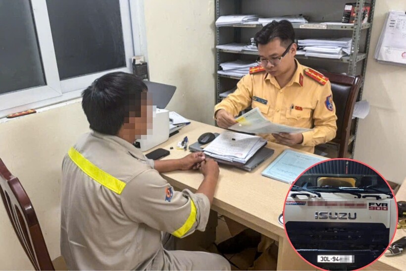 CSGT lập biên bản xử lý đối với tài xế xe bồn vi phạm. Ảnh CACC.