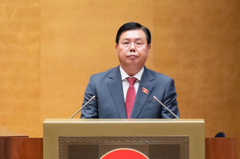 Bộ trưởng Bộ Nội vụ Nguyễn Tiến Hải trình bày báo cáo tiếp thu, giải trình (Ảnh: Media Quốc hội).