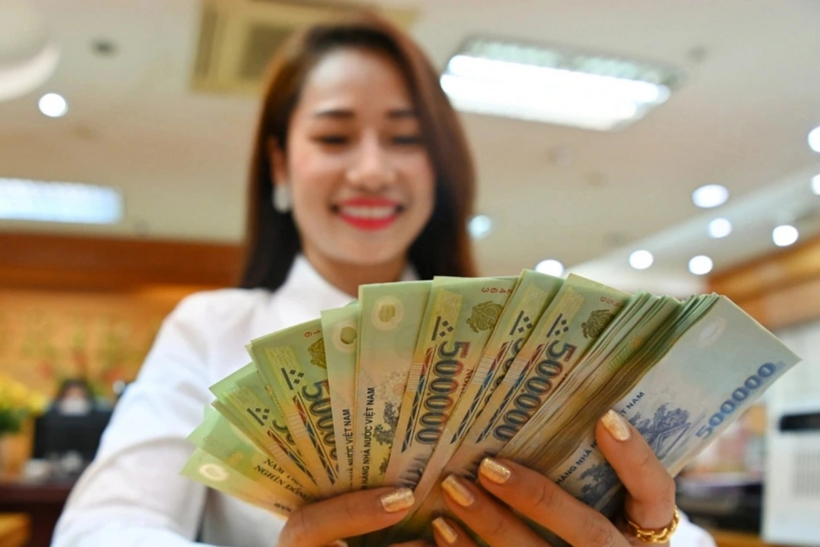 Giao dịch ngân hàng (Ảnh minh họa: Tiến Tuấn).