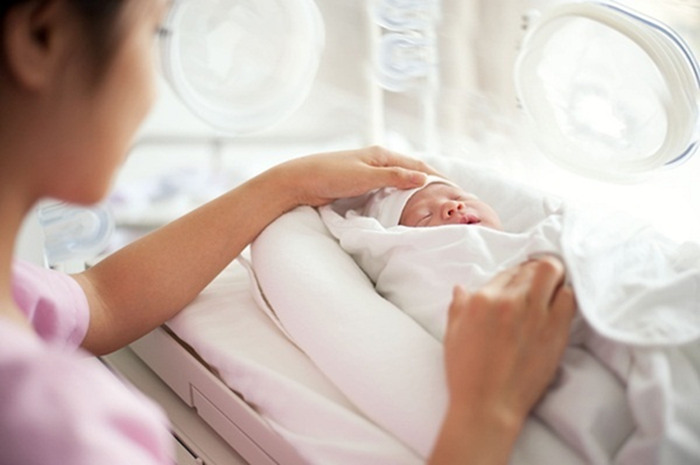 HĐND TP.Hà Nội vừa thông qua nghị quyết quy định mức chi thực hiện công tác dân số và phát triển, trong đó có chính sách hỗ trợ 4 triệu đồng cho phụ nữ sinh đủ hai con trước 35 tuổi. Ảnh minh họa: Người đưa tin
